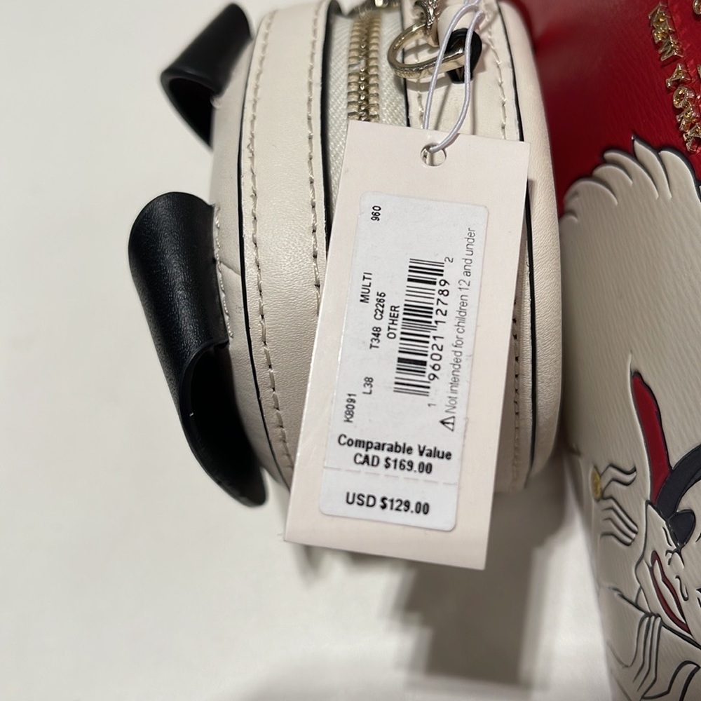 Kate Spade Claude Dog Coin Purse
COLOR:
Multi - Picture 10 of 16